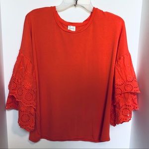 Cupio tangerine top,size large,eyelet lace sleeve